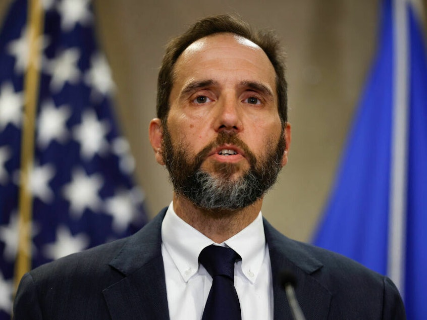 caption: Justice Department special counsel Jack Smith delivers remarks on a recently unsealed indictment against former President Donald Trump on Friday.