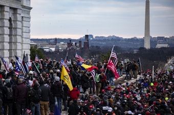 caption: A pro-Trump mob stormed the U.S. Capitol on Jan. 6, 2021. Now, a nonprofit group said it has raised around $900,000 for the alleged rioters, but some of their families are raising questions about how the money is being spent.