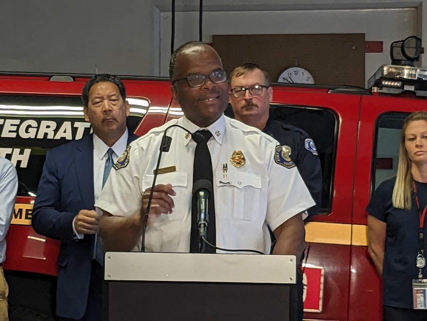 caption: Seattle Fire Chief Harold Scoggins gives an update on the Health 99 overdose response unit at a media briefing on Tuesday, September 19