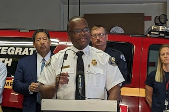 caption: Seattle Fire Chief Harold Scoggins gives an update on the Health 99 overdose response unit at a media briefing on Tuesday, September 19