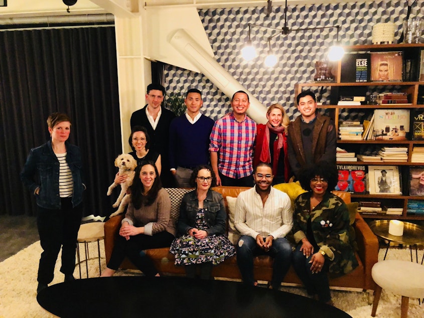 caption: KUOW's first Pop-Up crew at The Cloud Room in Seattle after their Curiosity Club dinner. Far left: Dacia Clay, KUOW producer Kristin Leong with Radley the dog. Back row: Patrick Holderfield, Uly Rivera, Abel Pacheco, Paula Pessotto, Joe Santiago. Front row: KUOW reporter Patrica Murphy, Rachel Oppenheim, Dy Johnson, Ishea Brown. February 28, 2019. 