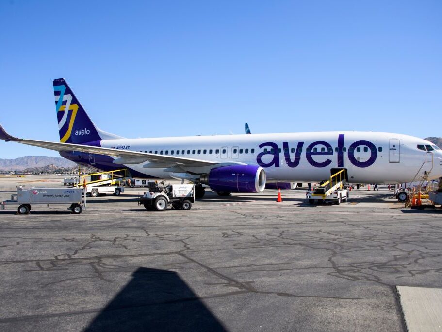 caption: An Avelo Airlines jet on the tarmac at Hollywood Burbank Airport in 2021. The budget airline is set to begin operating deportation flights for ICE next month.
