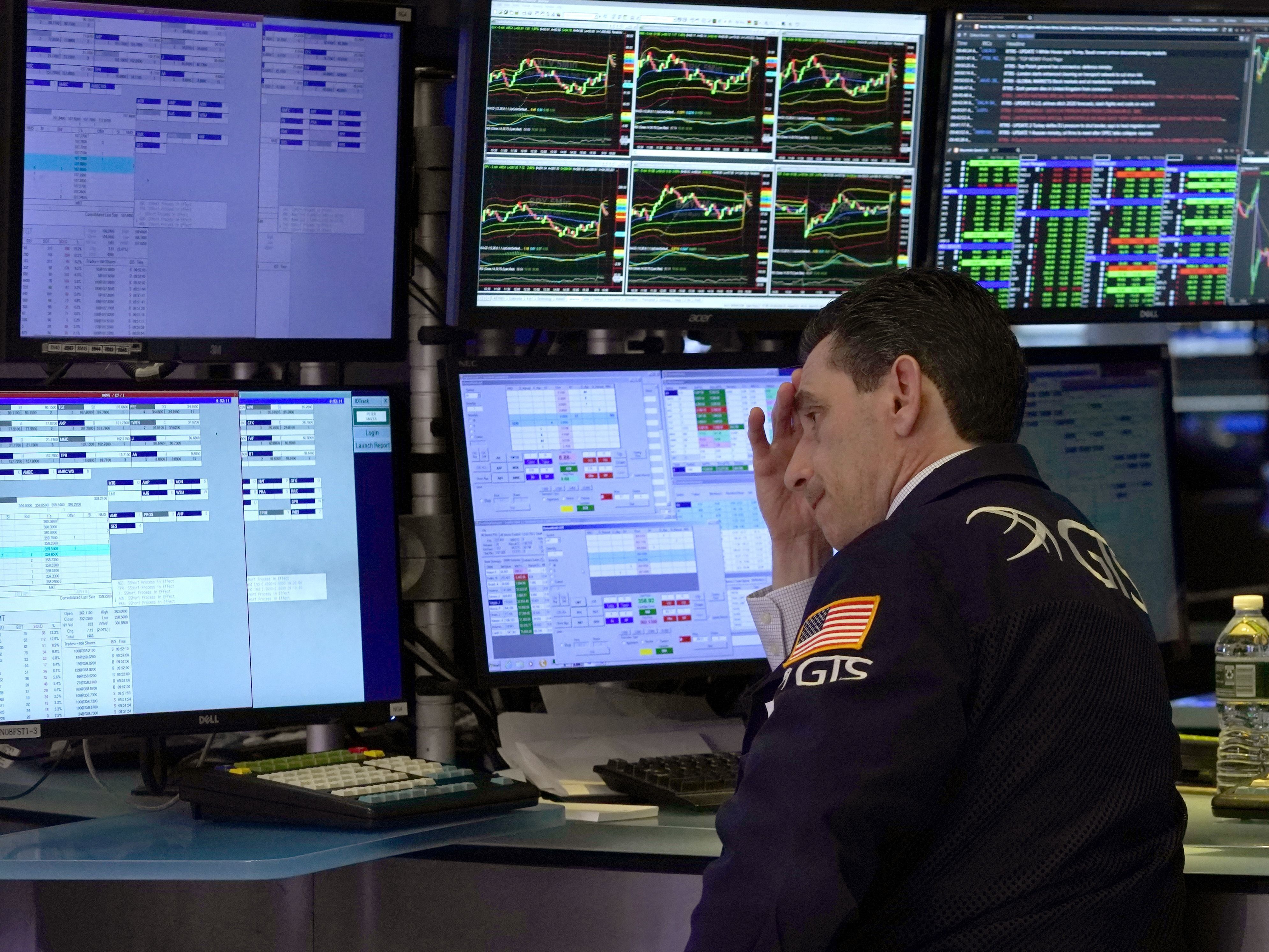 caption: The stock market has continued to be volatile in in recent weeks over growing fears that the coronavirus epidemic will push the world economy into recession.