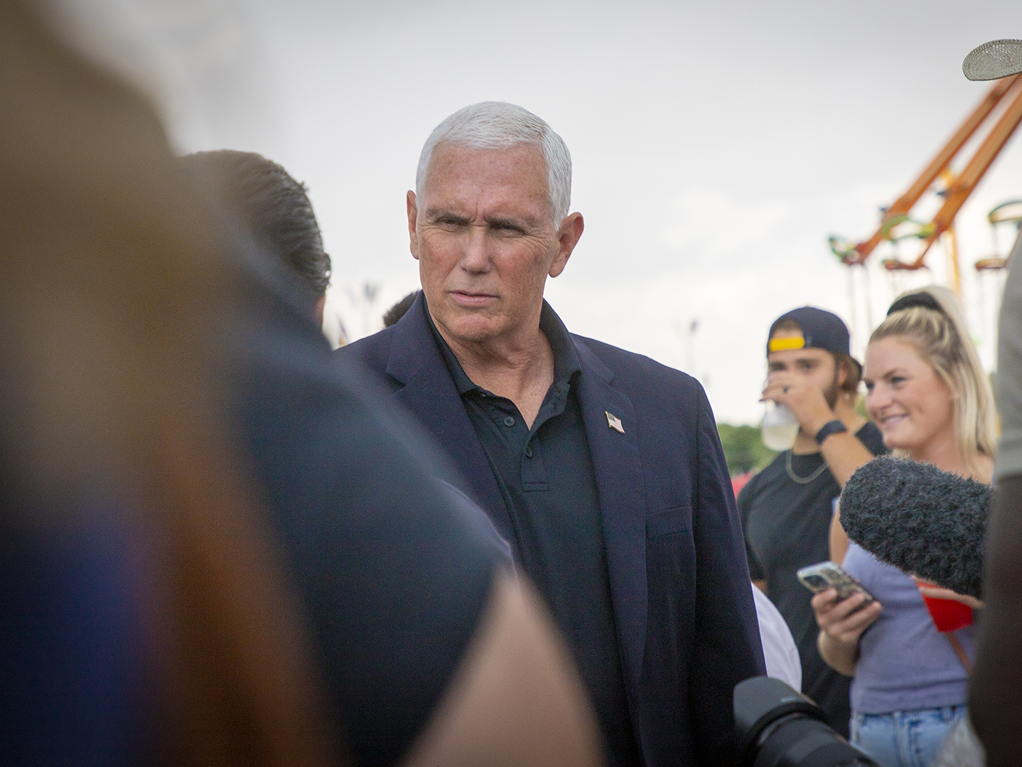 caption: Former Vice President Mike Pence campaigns for Sen. Chuck Grassley at the Iowa State Fair in Des Moines, Iowa on August 19, 2022.