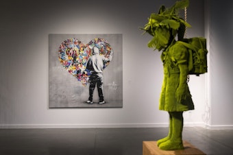 caption: SLIDESHOW: Artworks by Martin Whatson of Norway, center, and Kim Simonsson of Finland, right, are on display inside the Northern Exposure exhibit on Wednesday, May 2, 2018, at the new Nordic Museum in Seattle.