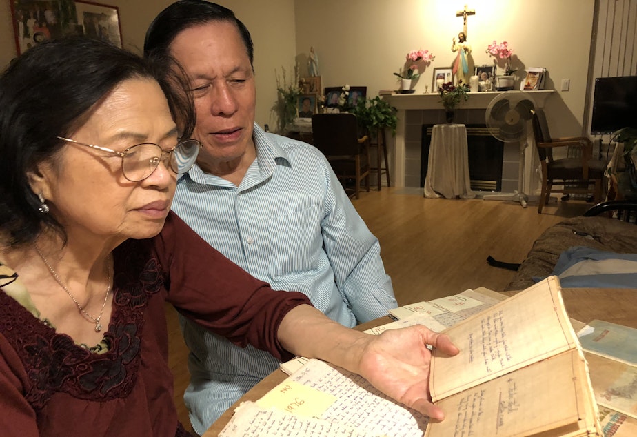 Thanh Ta (right) was a prisoner in a Communist re-education camp after the Vietnam War. As a way to connect with his family thousands of miles away, he wrote letters, poems and stories. When he immigrated to the United States, he kept every single piece of writing. He reads over them with his wife, Nu, over 40 years after they were written.