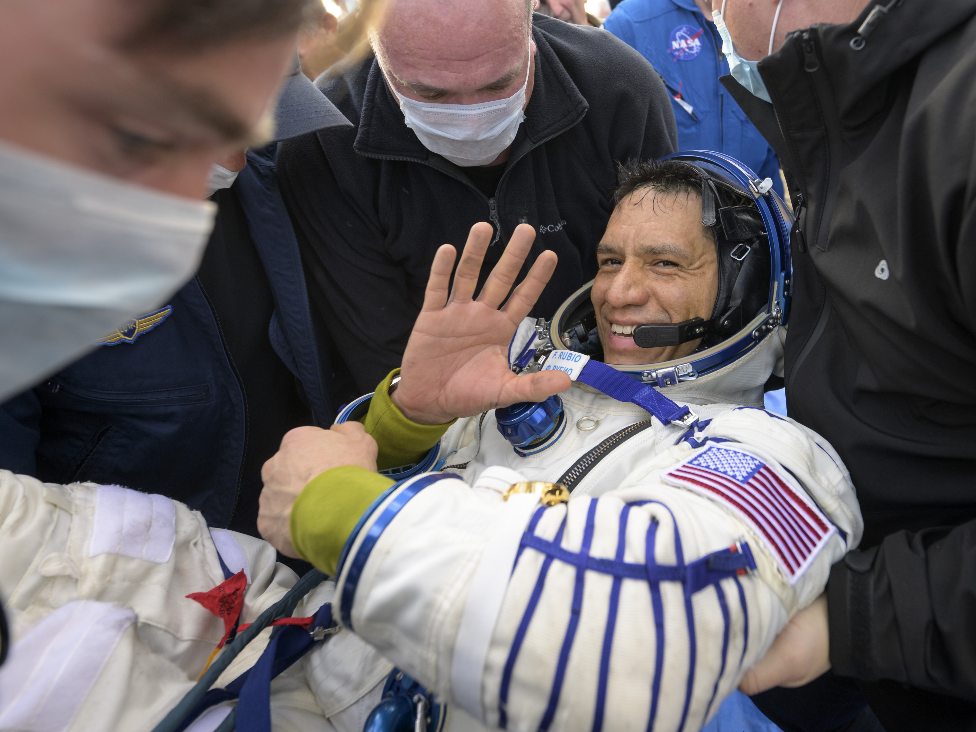 caption: Frank Rubio is helped out of the Soyuz MS-23 spacecraft just minutes after he and cosmonauts Sergey Prokopyev and Dmitri Petelin landed in a remote area of Kazakhstan on Sept. 27, 2023.