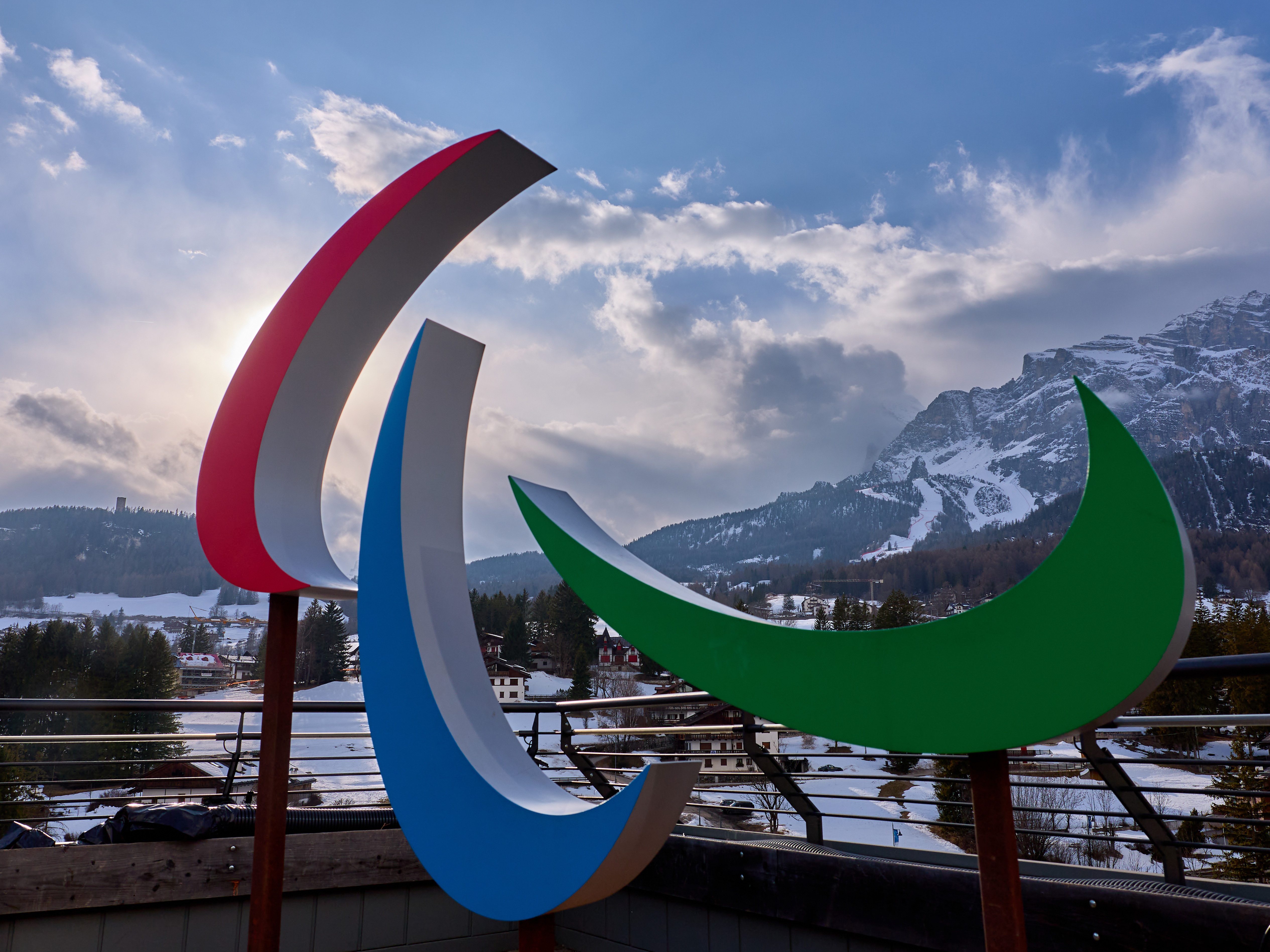 caption: The Paralympic logo, the Agitos, is seen in Cortina d'Ampezzo, Italy ahead of the opening ceremony on March 6. They run through March 15.
