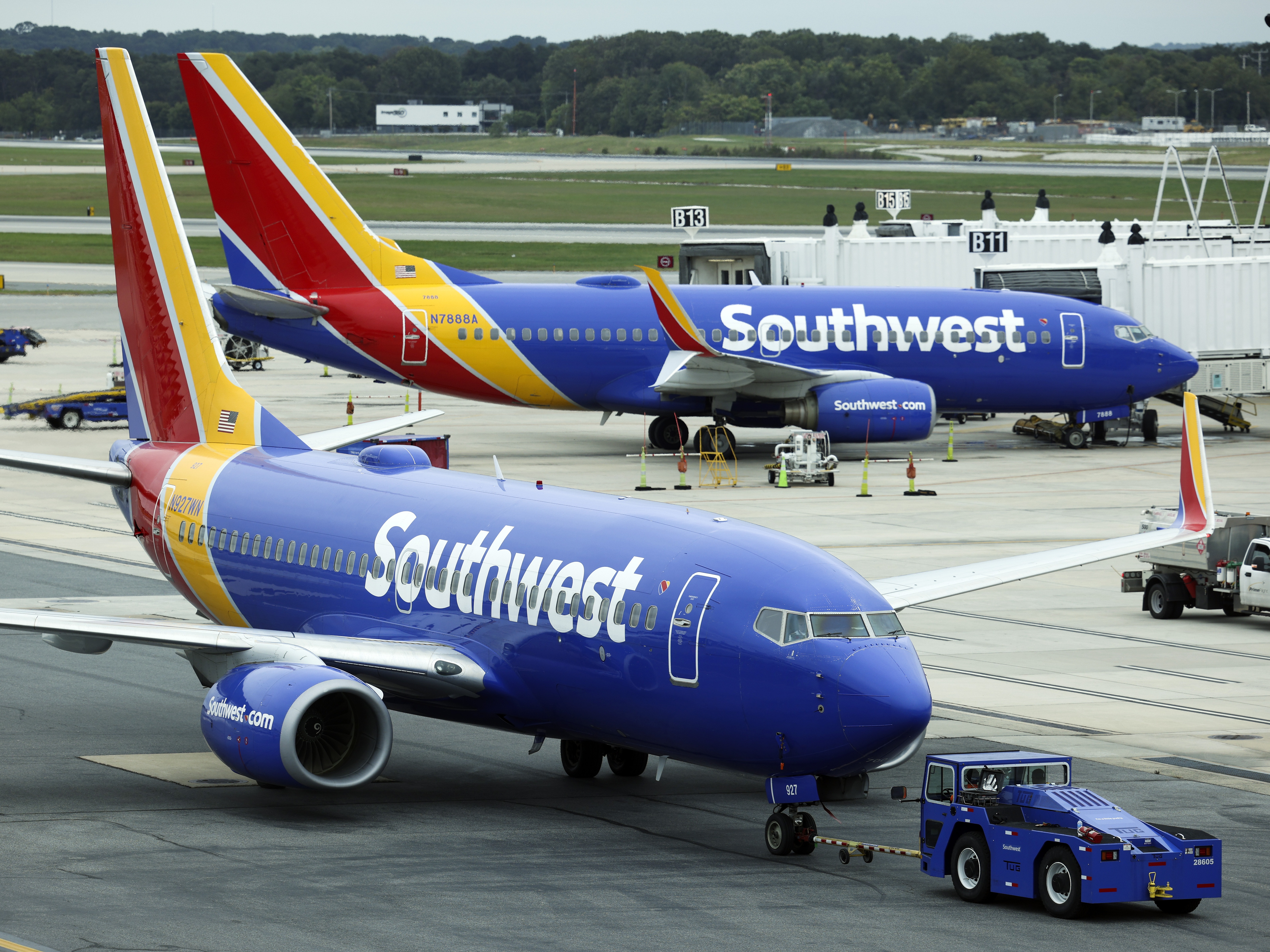 caption: Southwest Airlines planes are seen at Baltimore Washington International Thurgood Marshall Airport in 2021. The airline is requiring passengers using portable chargers in-flight to make them visible to the crew.