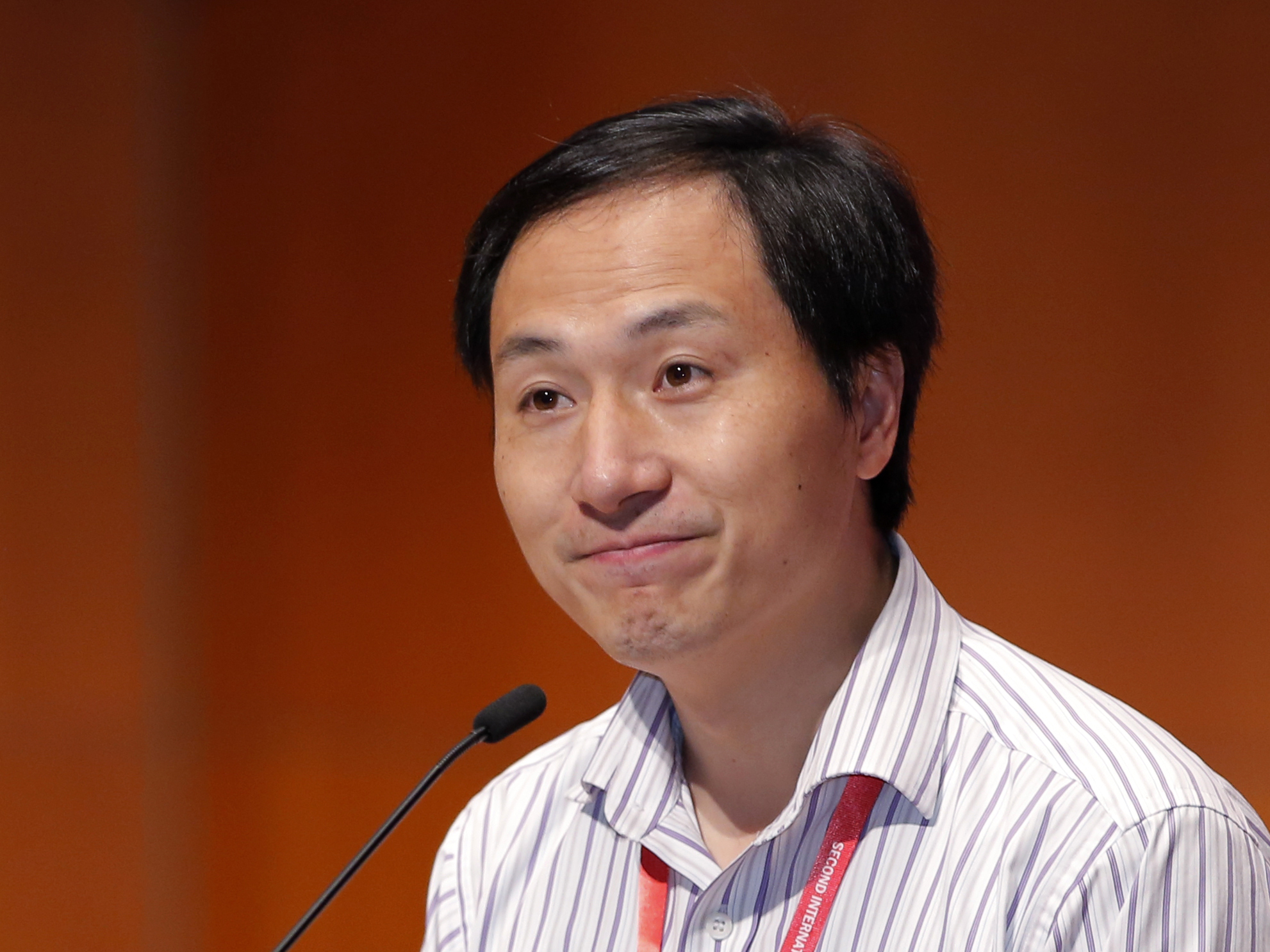 caption: Researcher He Jiankui spoke Wednesday during the 2nd International Summit on Human Genome Editing in Hong Kong.