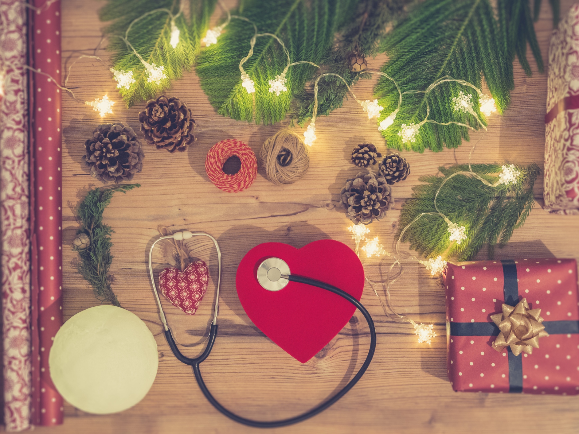 caption: Too much merry-making with rich foods and alcohol can strain the heart. So can stress over the holidays.