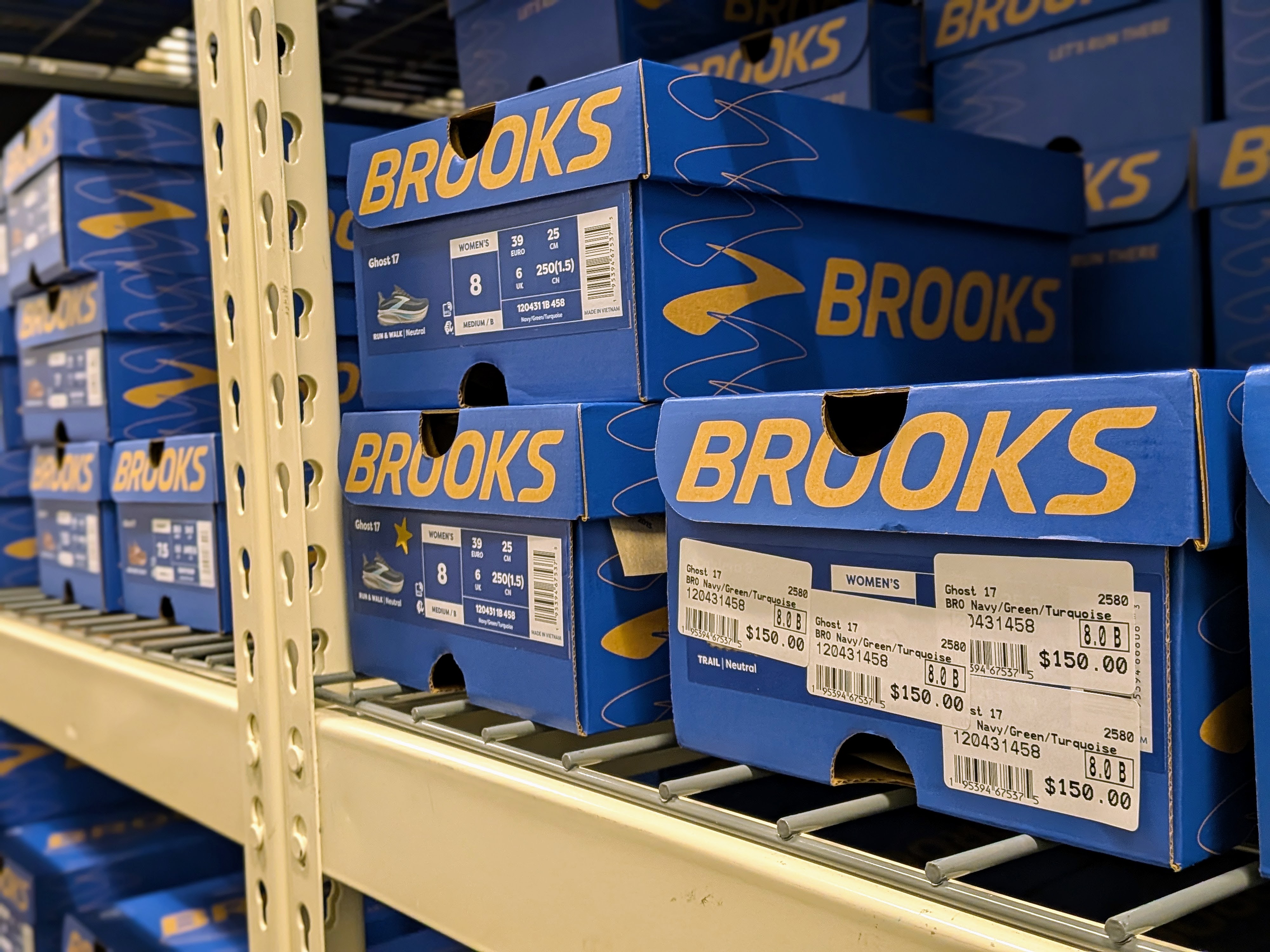 caption: Brooks running shoes stocked at the company's flagship store in Seattle's Fremont neighborhood.