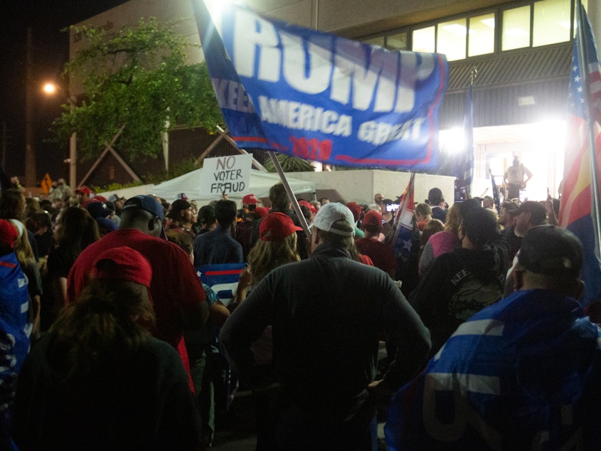 caption: Supporters of President Trump gather to protest the election results at the Maricopa County Elections Department office on November 4, 2020 in Phoenix, Arizona.