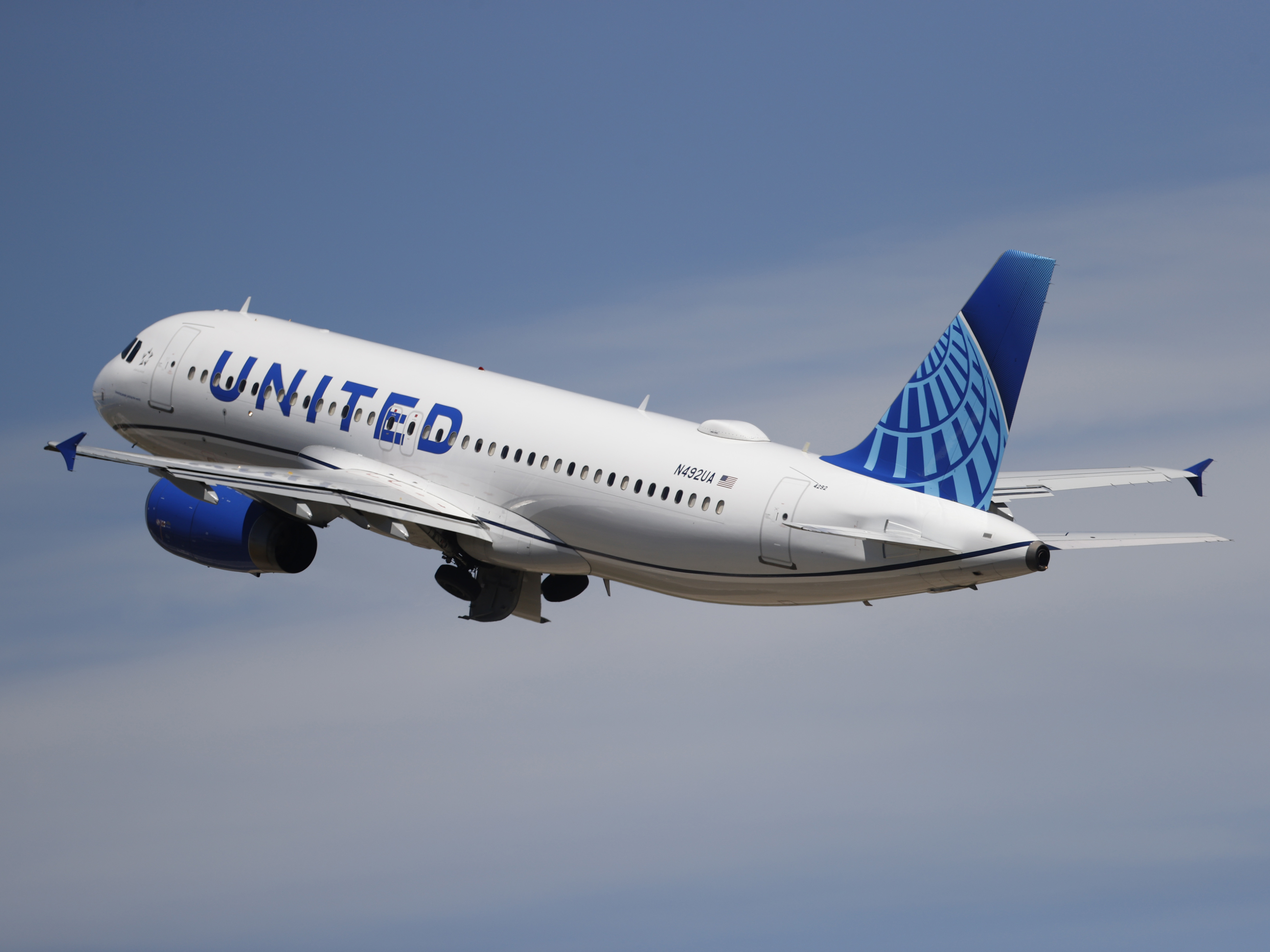 caption: A United Airlines jetliner lifts off from a runway at Denver International Airport on June 10, 2020. United says it will start boarding passengers in economy class with window seats first starting next week in an effort to speed up boarding times.