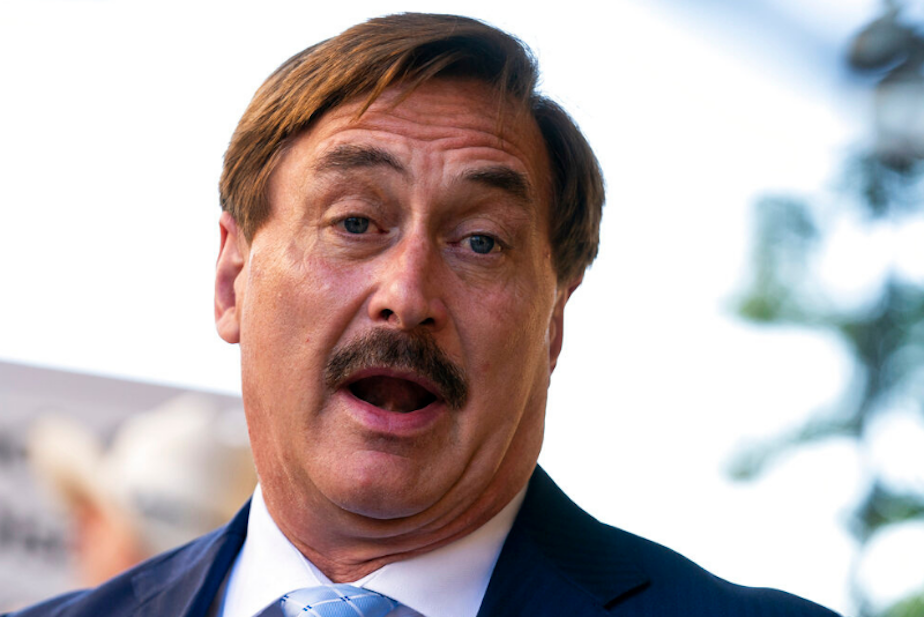 caption: MyPillow chief executive Mike Lindell, speaks to reporters outside federal court in Washington DC, Thursday, June 24, 2021. Lindell has promoted conspiracy theories that the 2020 election was stolen from Donald Trump and has hosted large events promoting these theories. 