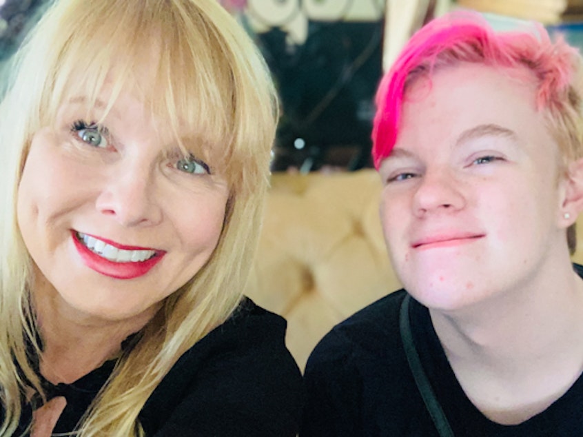 caption: Kaysen Ford, right, reflects during a StoryCorps conversation with their mother, Jennifer Sumner, on years of milestones — and struggles — while growing up transgender.