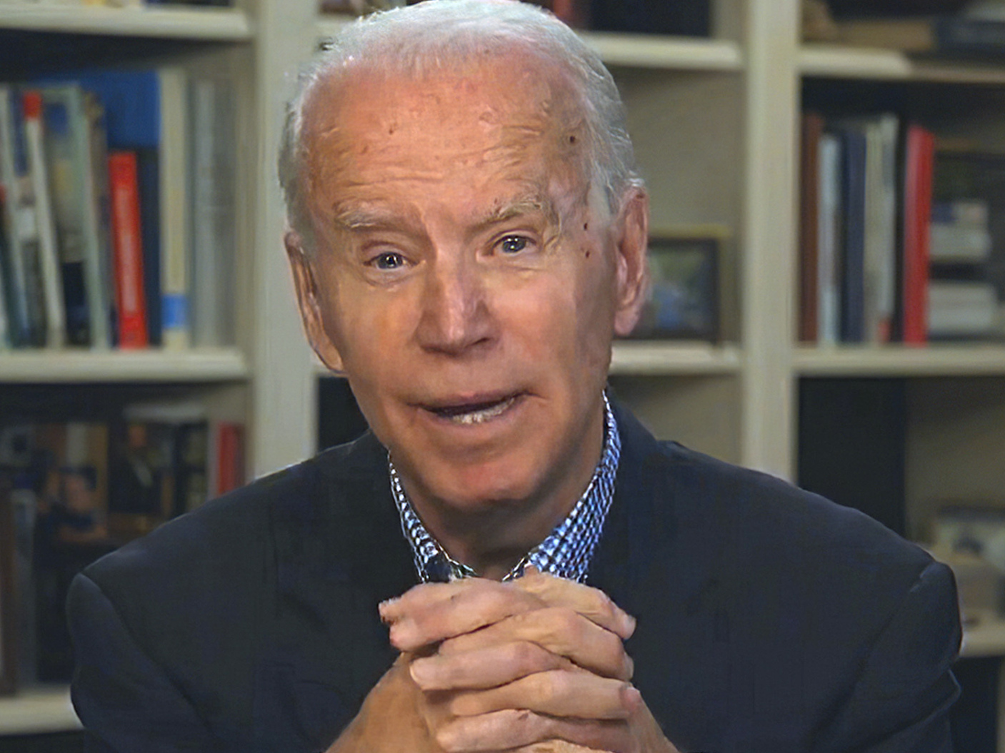 caption: In this image from video provided by the Biden for President campaign, former Vice President Joe Biden speaks during a virtual press briefing Wednesday.