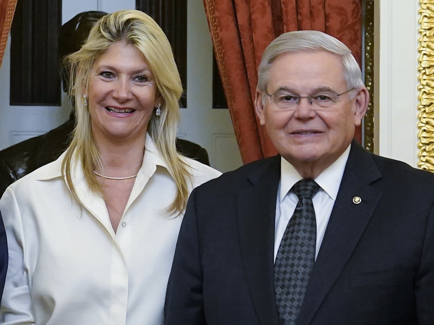 caption: Senate Foreign Relations Committee Chairman Sen. Bob Menendez, D-N.J., and his wife Nadine Arslanian, pose for a photo on Capitol Hill in Washington, Dec. 20, 2022. U.S. Sen. Bob Menendez of New Jersey and his wife have been indicted on charges of bribery.
