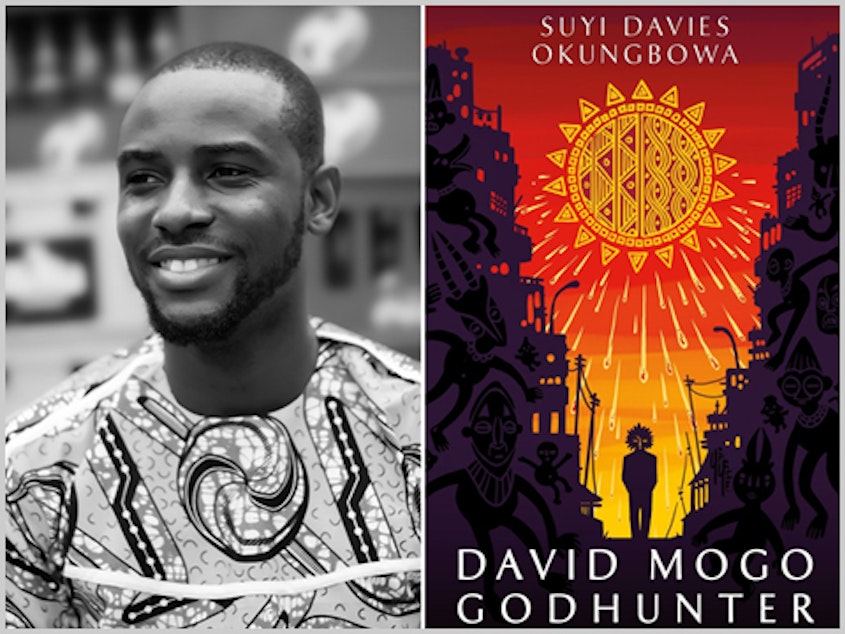 caption: Author Suyi Davies Okungbowa with the cover of his first novel: David Mogo, Godhunter.