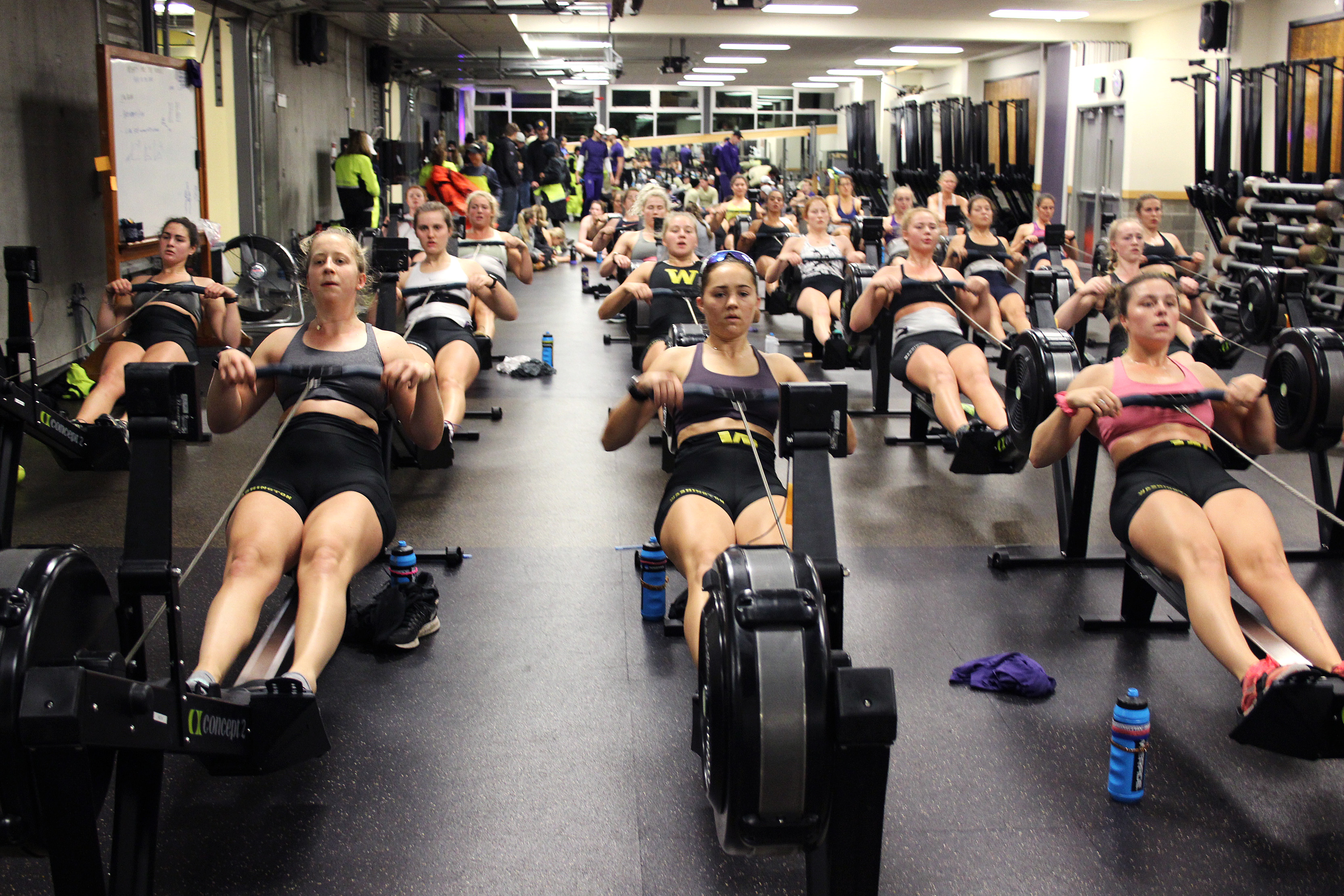 caption: UW Women's crew during an early morning work out. 