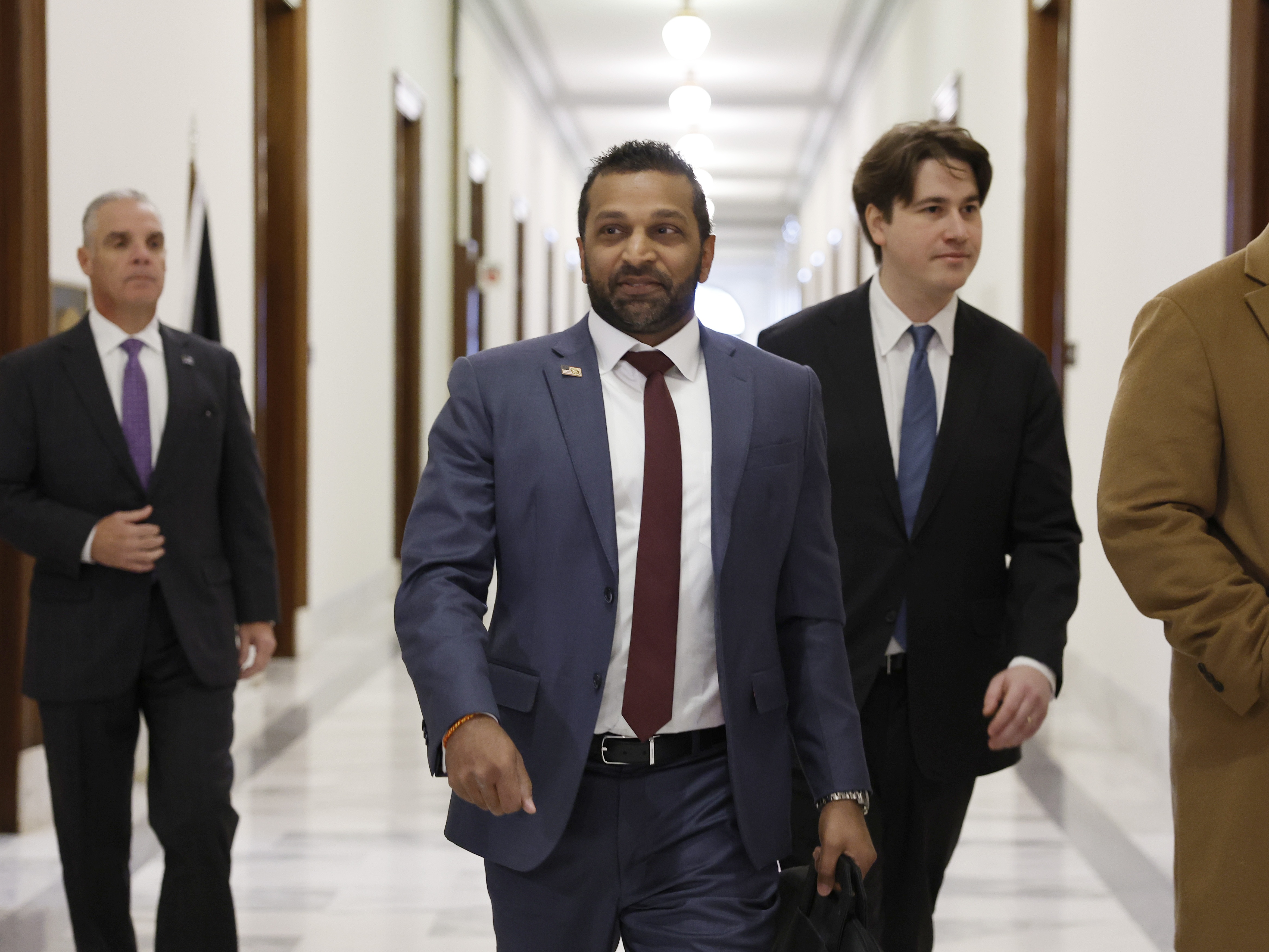 caption: Kash Patel arrives for meetings with senators in December 2024 in Washington, D.C.