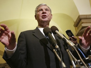 caption: Former Senate Intelligence Committee Chairman Sen. Bob Graham, D-Fla., gestures as he answers questions on Capitol Hill, June 18, 2002, in Washington.