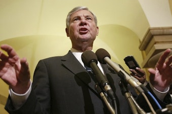 caption: Former Senate Intelligence Committee Chairman Sen. Bob Graham, D-Fla., gestures as he answers questions on Capitol Hill, June 18, 2002, in Washington.