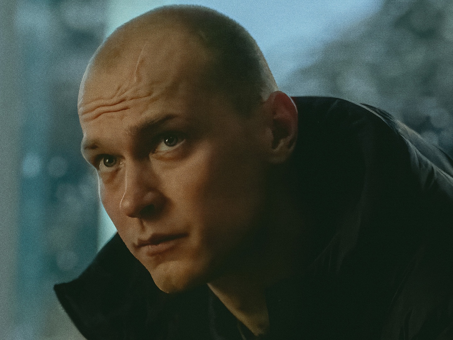 caption: Yura Borisov as Igor in <em>Anora.</em>