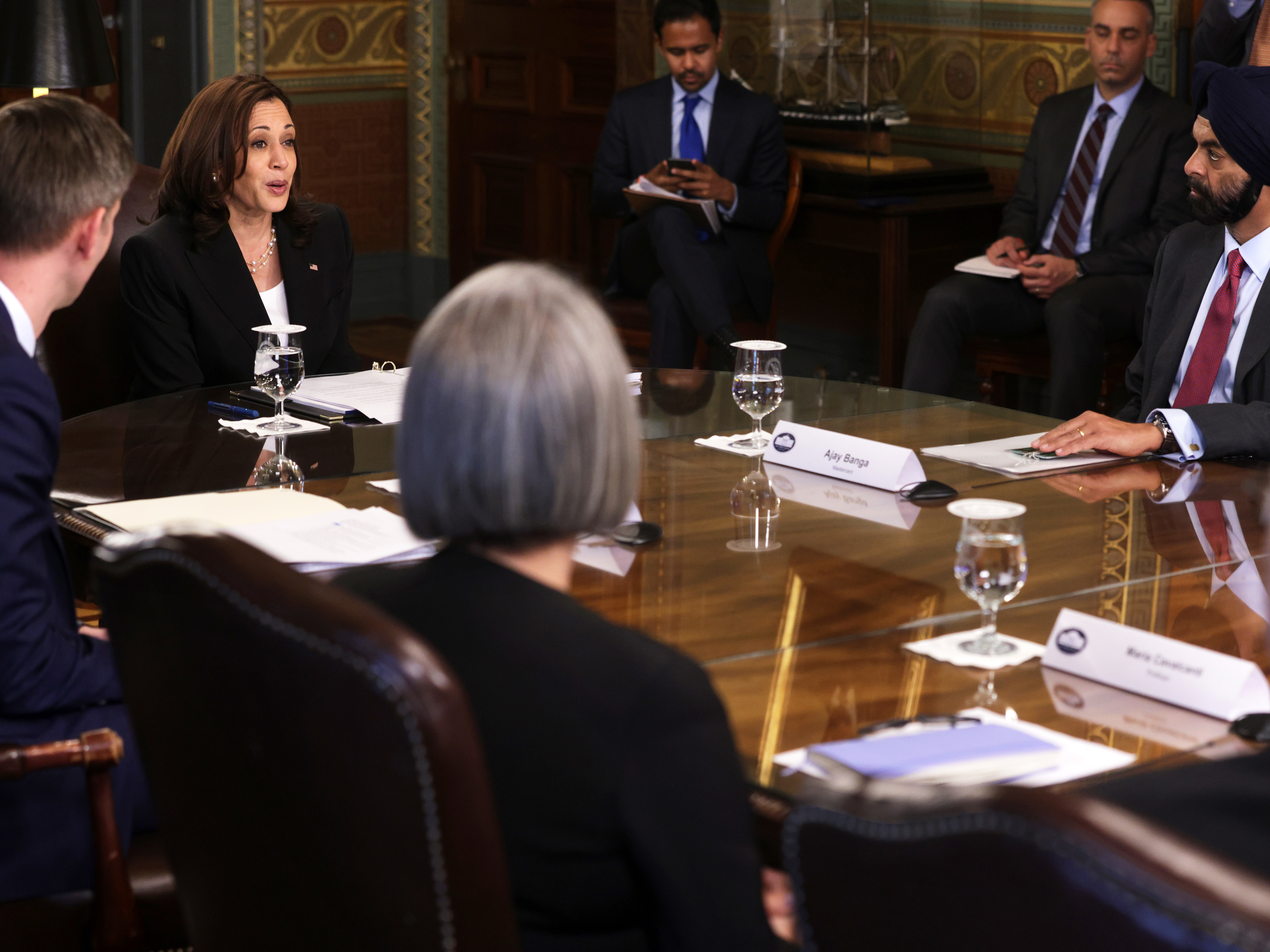 caption: Vice President Harris delivers opening remarks at a meeting Thursday with business leaders who gathered to discuss the Northern Triangle in Central America. The region includes Guatemala, Honduras and El Salvador.