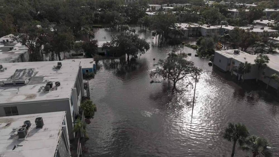 caption: Flood waters sit in an apartment complex where people are being rescued in the aftermath of Hurricane Milton, Thursday, Oct. 10, 2024, in Clearwater, Fla. (Mike Stewart/AP)