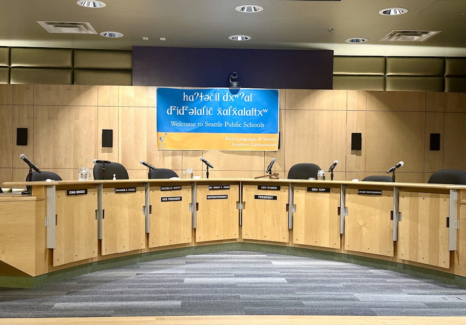 caption: Vivian Song and Lisa Rivera's names were removed from the Seattle School Board dais Wednesday, a week after they resigned from the board. The board hopes to have two new board members in place in April.