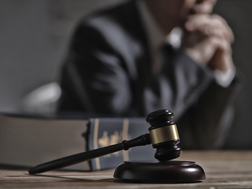 caption: About nine in 10 people accused of crimes in federal courts are represented by a public defender or court-appointed attorney. If Congress proceeds with its current budget plans, the defenders may need to lose nearly 500 full-time staff members.