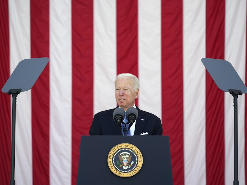 caption: President Joe Biden speaks during the National Memorial Day Observance at Arlington National Cemetery Monday. His budget proposal drops a decades-long ban on public funding for abortion.