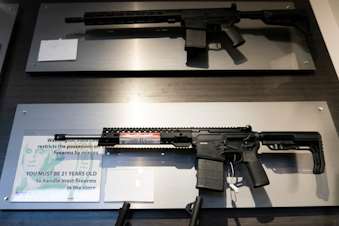 caption: Semi-automatic rifles are displayed at Rainier Arms Friday, April 14, 2023, in Auburn, Wash. before potential legislation that would ban future sale of similar weapons in the state. House Bill 1240 would ban the future sale, manufacture and import of assault-style semi-automatic weapons to Washington State and would go into immediate effect after being signed by Gov. Jay Inslee. 