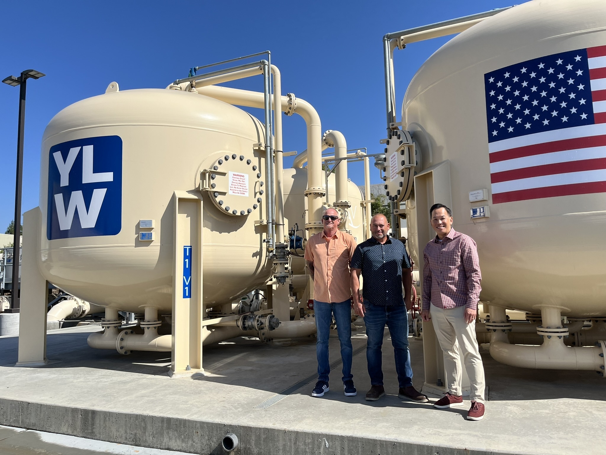 caption: John Brundahl (left), production superintendent, Todd Colvin, chief water systems operator, and Mark Toy, general manager, run the PFAS treatment plant at the Yorba Linda Water District in Orange County, Calif.