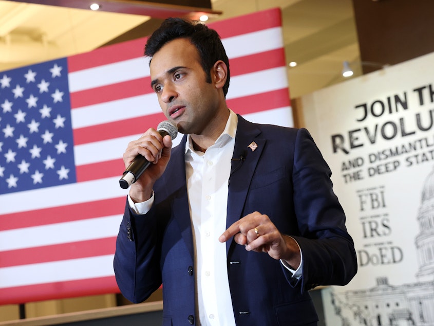 caption: Republican presidential candidate Vivek Ramaswamy speaks at his caucus night event at the Surety Hotel on January 15, 2024 in Des Moines, Iowa.