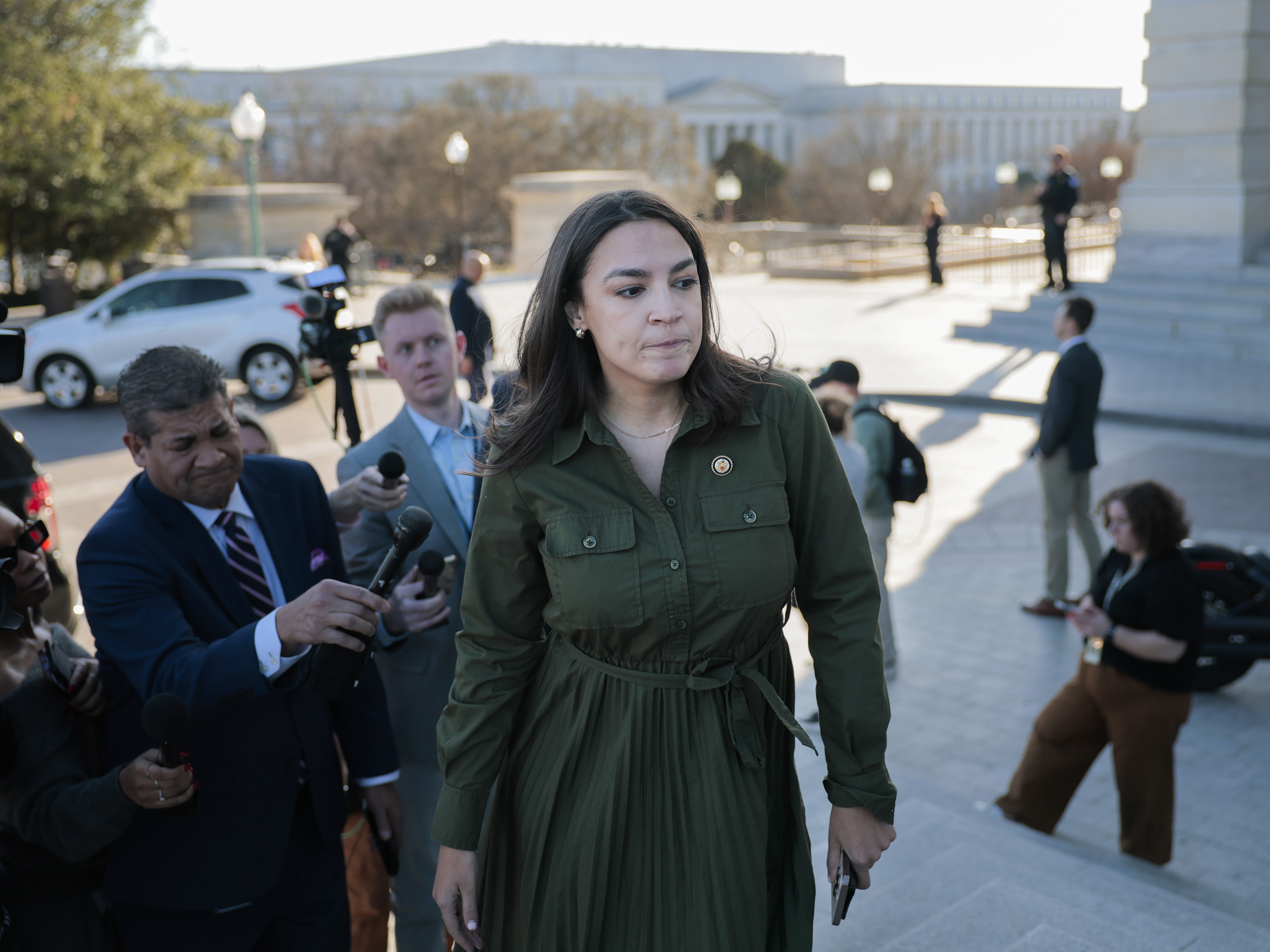 caption: House Democrats, including Rep. Alexandria Ocasio-Cortez, D-N.Y., responded quickly to news that Senate Minority Leader Chuck Schumer, D-N.Y., plans to vote for the House-passed spending measure that the party largely opposes.