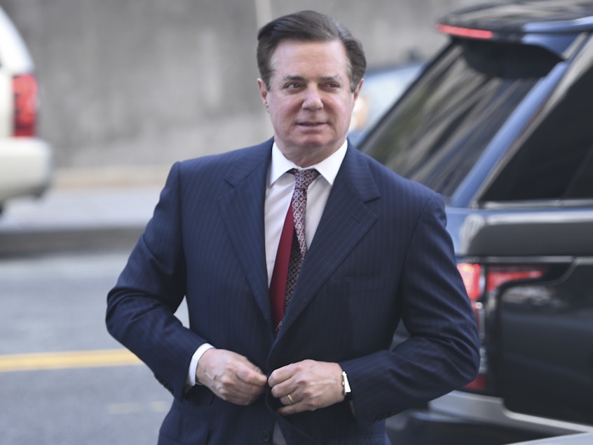 caption: Paul Manafort arrives for a hearing at U.S. District Court in Washington, D.C., on June 15. A new court filing says Manafort is suspected of having shared polling data with a business associate who has links to the Russian intelligence service.