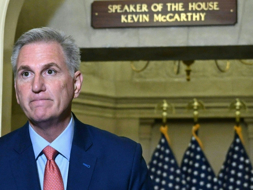 caption: House Speaker Kevin McCarthy continues to battle a group of conservatives who oppose any short term spending bill ahead of a likely government shutdown.