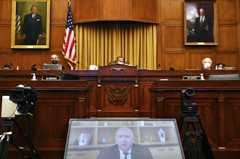 caption: Amazon CEO Jeff Bezos testifies remotely during a House Judiciary subcommittee on antitrust on Capitol Hill on Wednesday, July 29, 2020, in Washington. 
