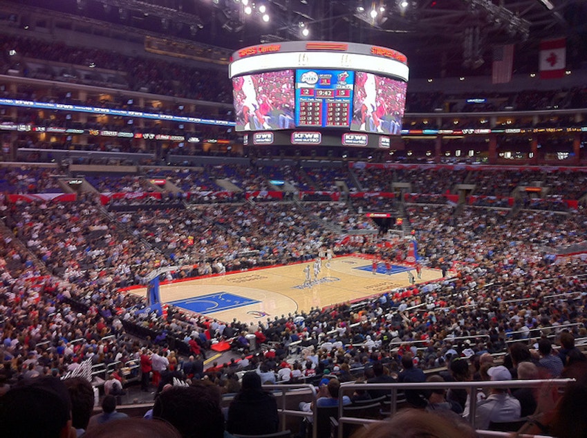 caption: The LA Clippers and the Miami Heat at the Staples Center in Los Angeles. 