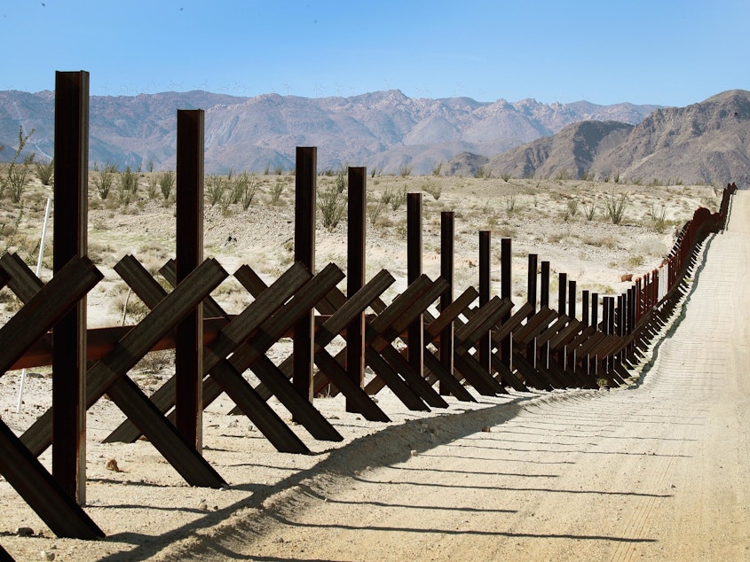 caption: A steel barrier runs along the border of the United States and Mexico near Calexico, California. Bipartisan negotiators on Capitol Hill are discussing what kind of physical barriers are needed and how much Congress should spend to address national security issues at the southwest border.