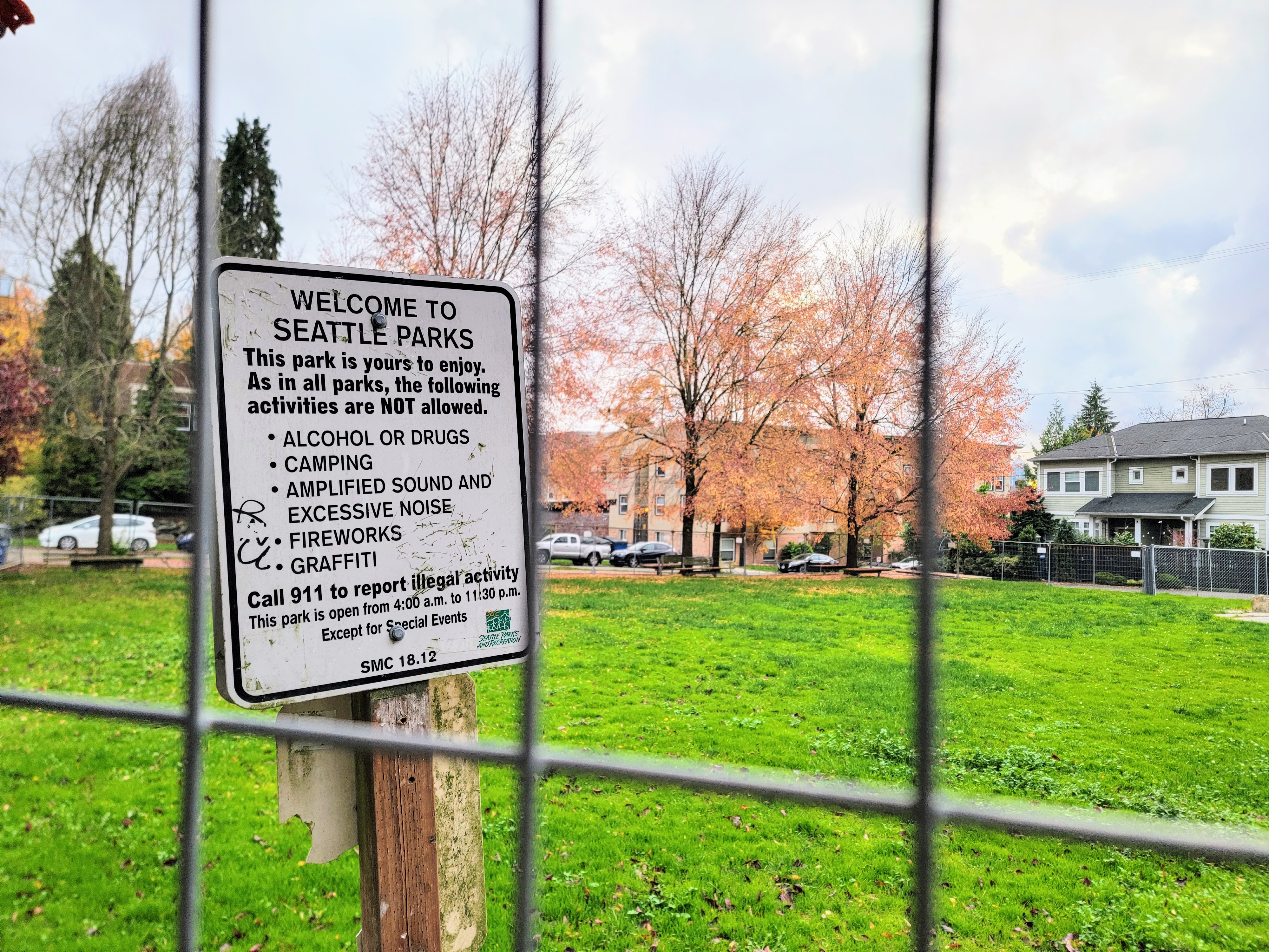 caption: Chain link fences surround Seven Hills Park on Tuesday, November 10, 2025.
