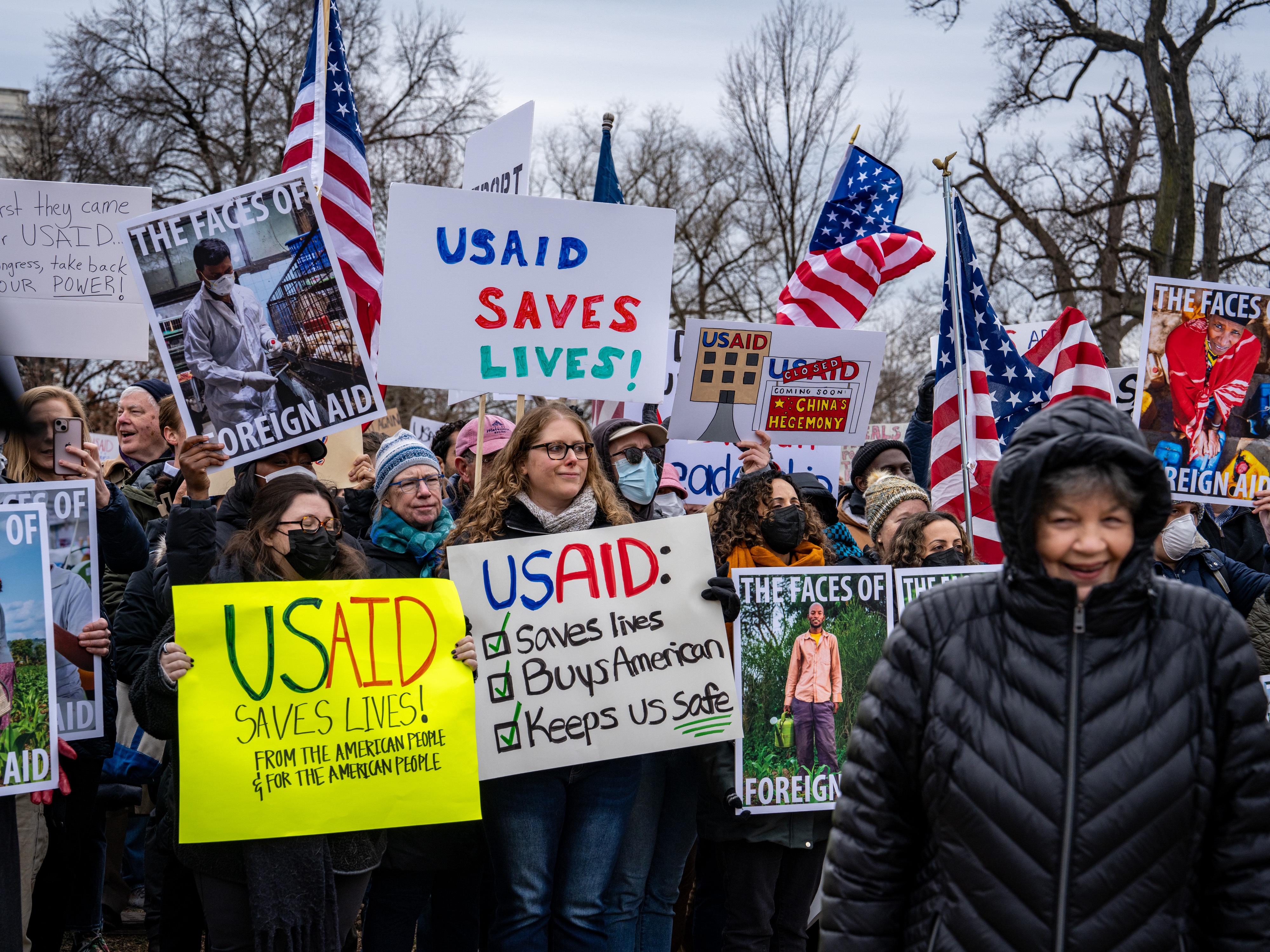 caption: Hundreds of people gathered near the Capitol to protest the dismantling of USAID, the international agency charged with dispensing humanitarian aid around the world on behalf of the United States.