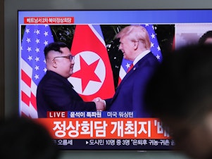 caption: A TV screen shows file footage of President Trump and North Korean leader Kim Jong Un during a news program seen at the Seoul Railway Station in Seoul, South Korea, Wednesday. During Trump's State of the Union address, he announced that the second summit with the North Korean leader will take place this month.