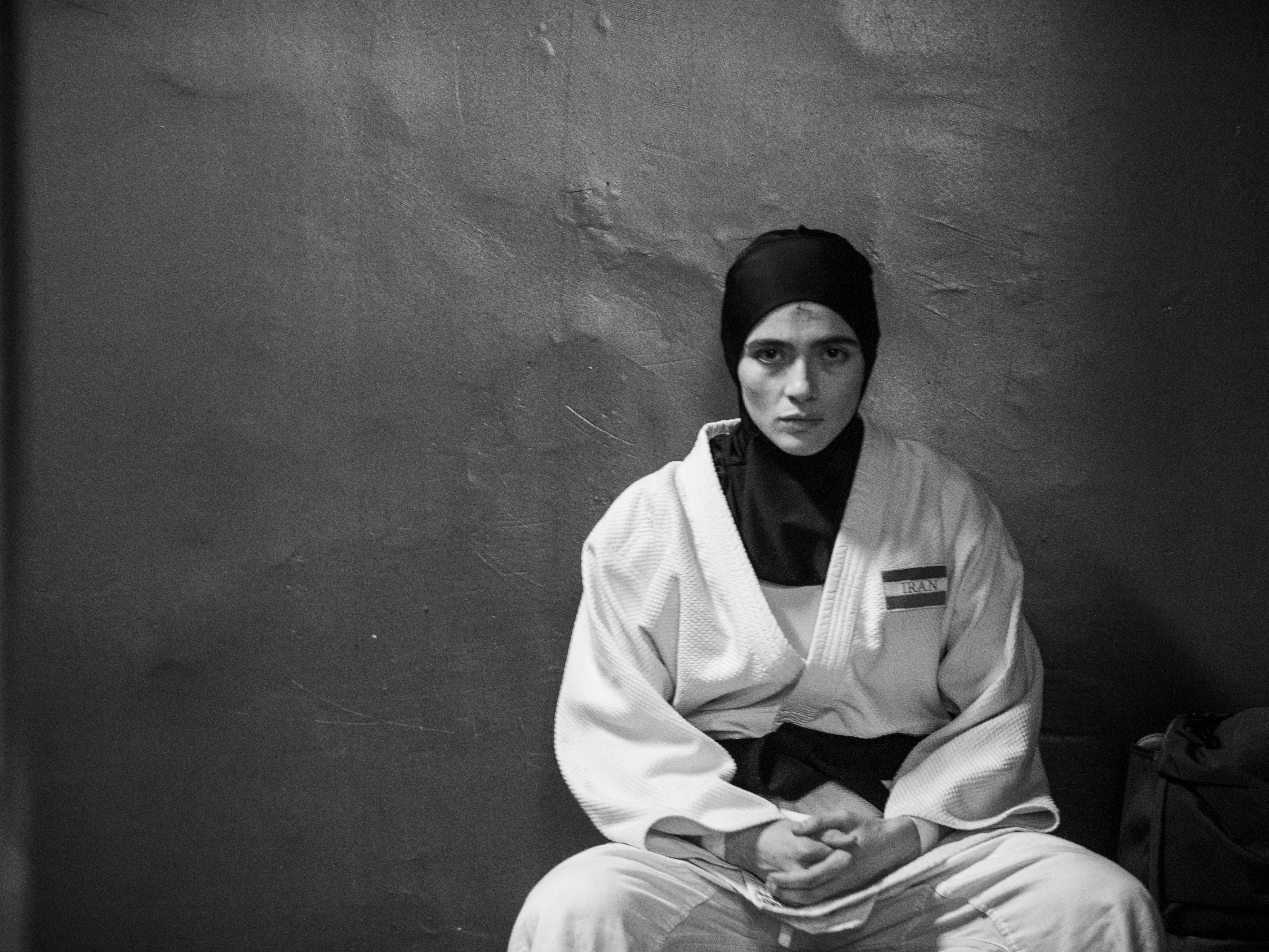 caption: Arienne Mandi plays Iranian judoka Leila Hosseini in the new film <em>Tatami</em>, co-directed by Guy Nattiv and Zar Amir.