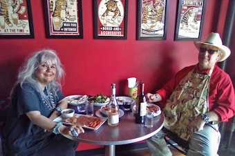 caption: Markeeta Little Wolf and her husband Mike Hubbard come to American 35 every Saturday. Mike Hubbard has a pizza named after him, called Mr. Hubbard's Saturday.