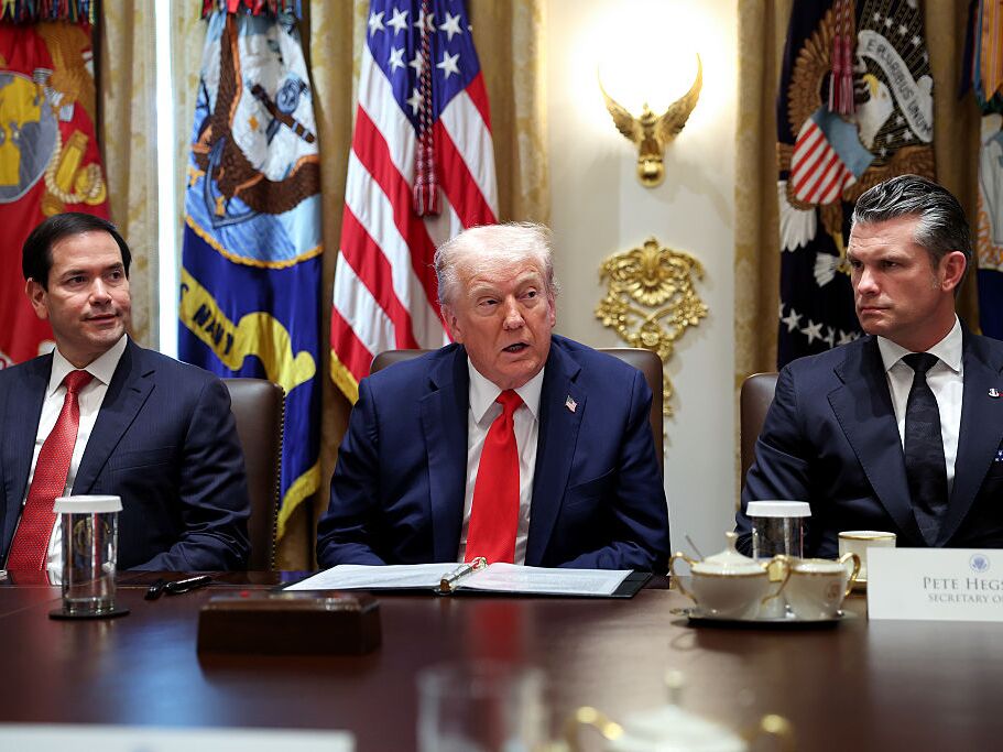 caption: President Trump, Secretary of State Marco Rubio (left) and Defense Secretary Pete Hegseth attend a Cabinet meeting at the White House on Oct. 9.