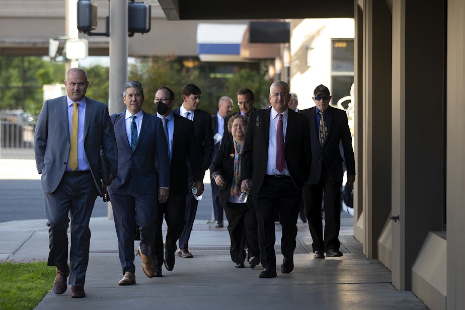caption: 4.A group of lawyers arrive at the final bankruptcy hearing for Cody Easterday, on Tuesday, July 19, 2022, in Yakima. 