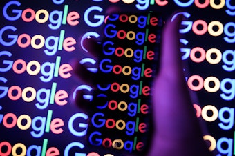 caption: Google is headed to trial in Washington D.C., where it will defend itself over the Justice Department's claims that it abused its monopoly power in its search engine business.